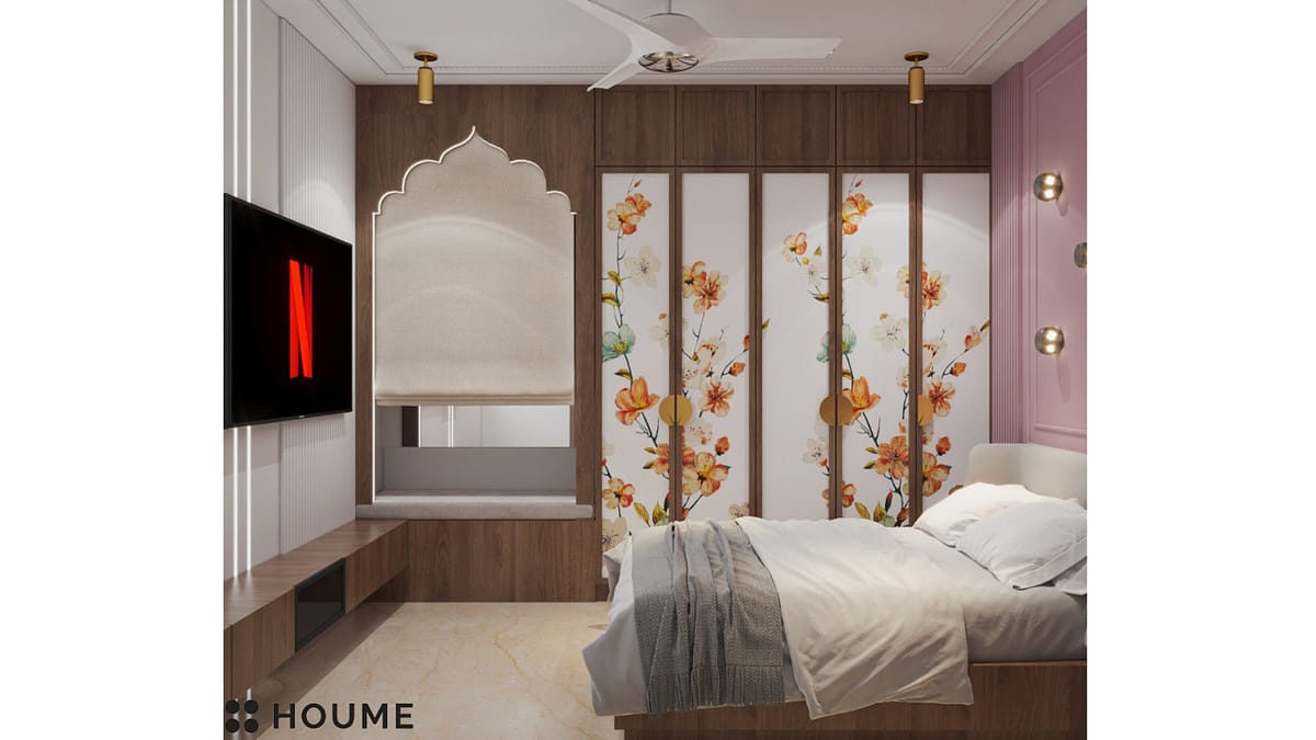 Modern indian bedroom design with floral wardrobe, pink accent wall, and recessed lighting. B