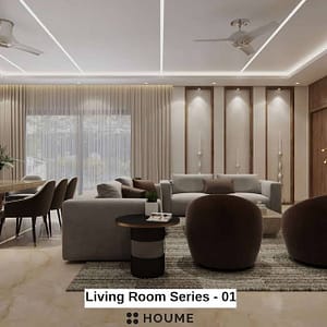 Living room featuring a ceiling fan with woven blades hanging from the ceiling. A brown leather couch sits on a woven jute rug. Two brown accent chairs flank a round wooden coffee table with a black metal base. Text overlay: Houme India - Interior Design Ideas.